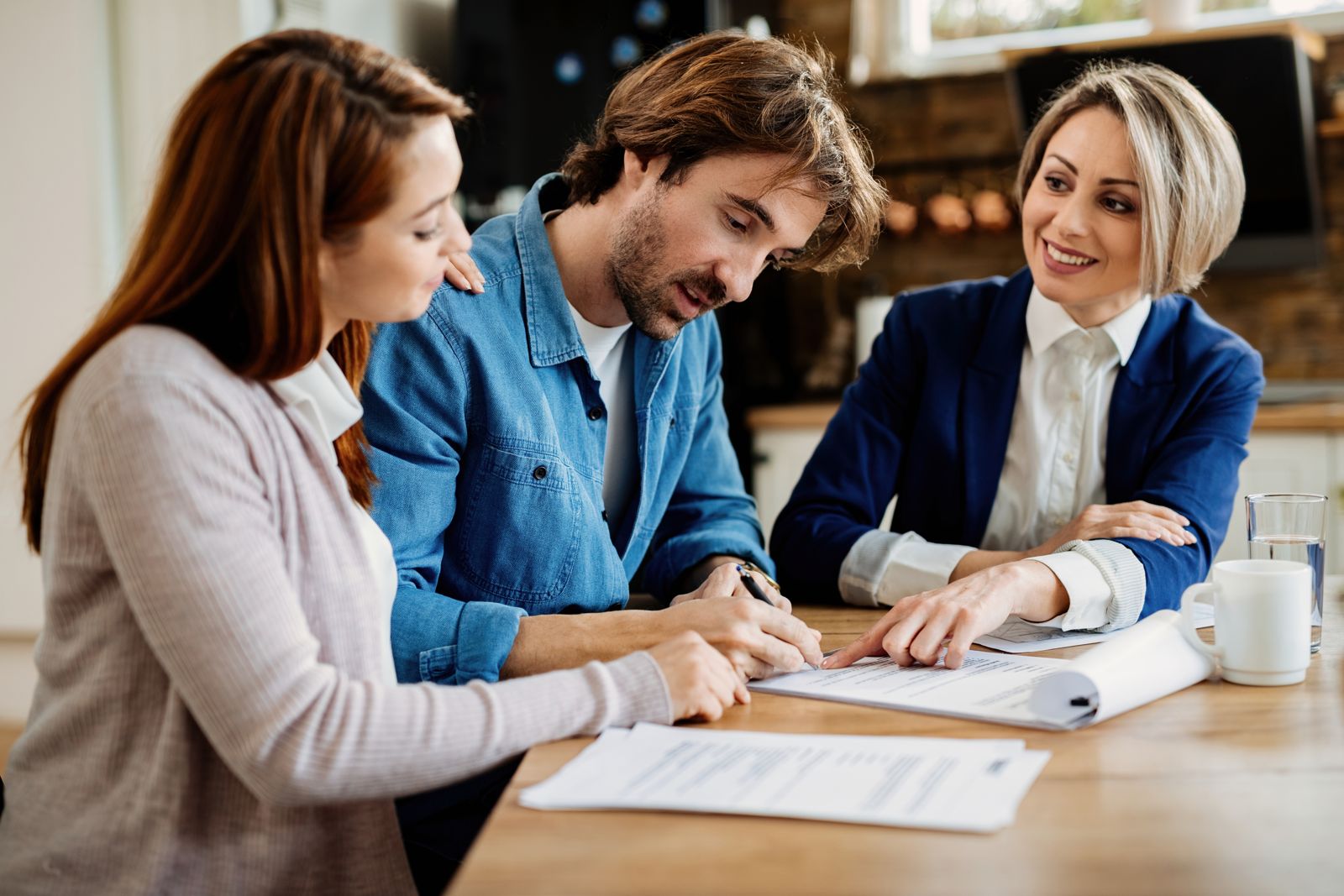 Tax advisor reviewing documents with clients